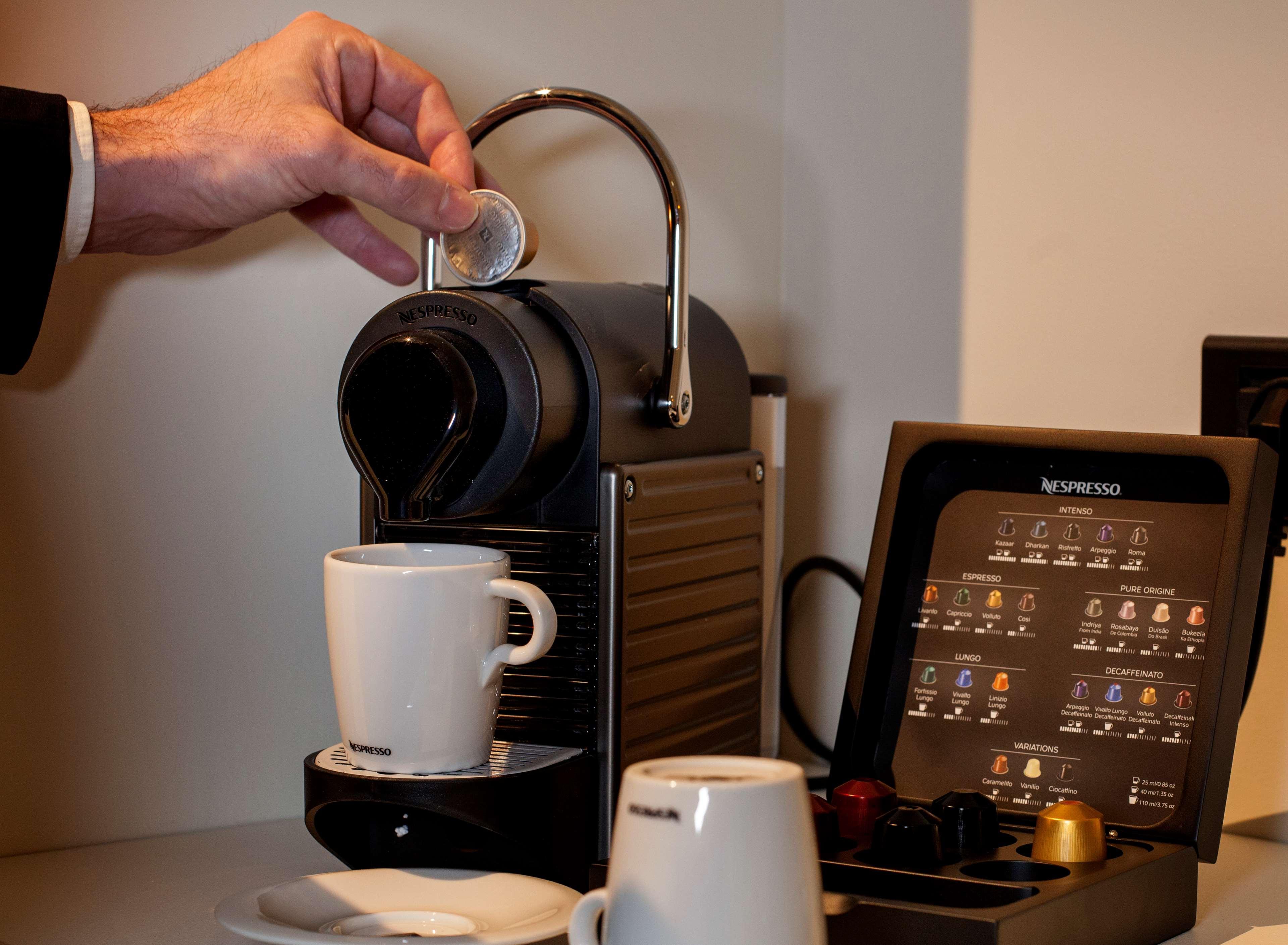 Hotel Lopez De Haro Билбао Екстериор снимка A Nespresso machine