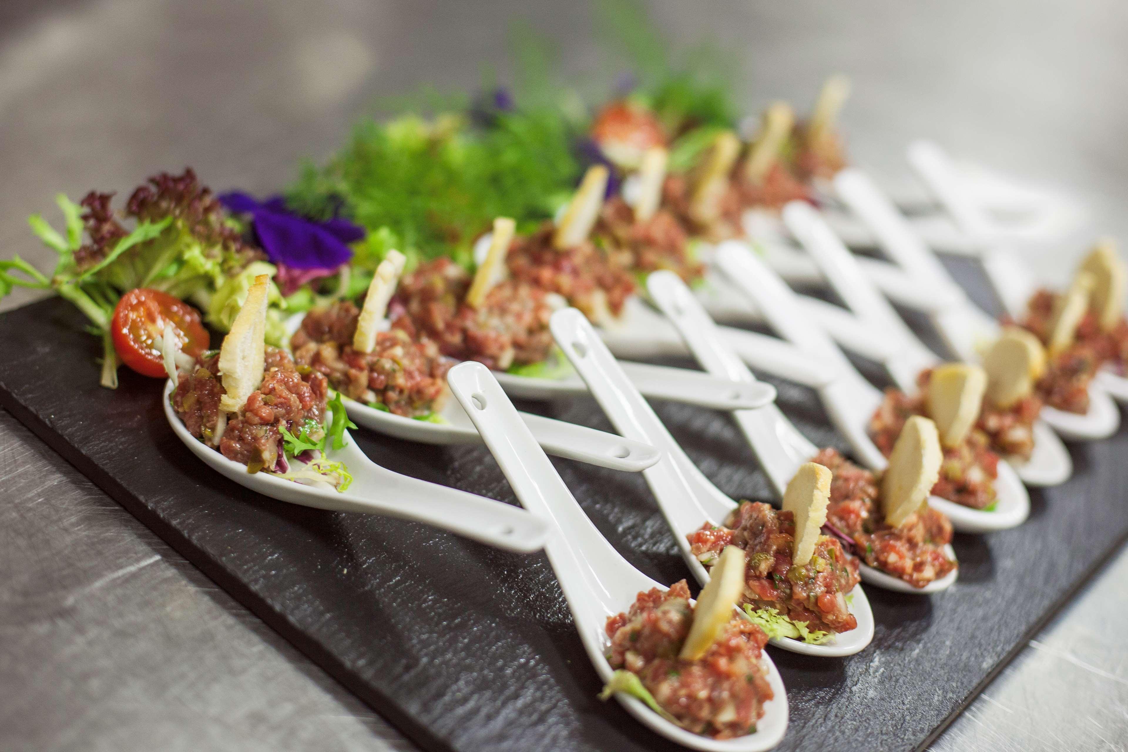 Hotel Lopez De Haro Билбао Екстериор снимка A serving of beef tartar